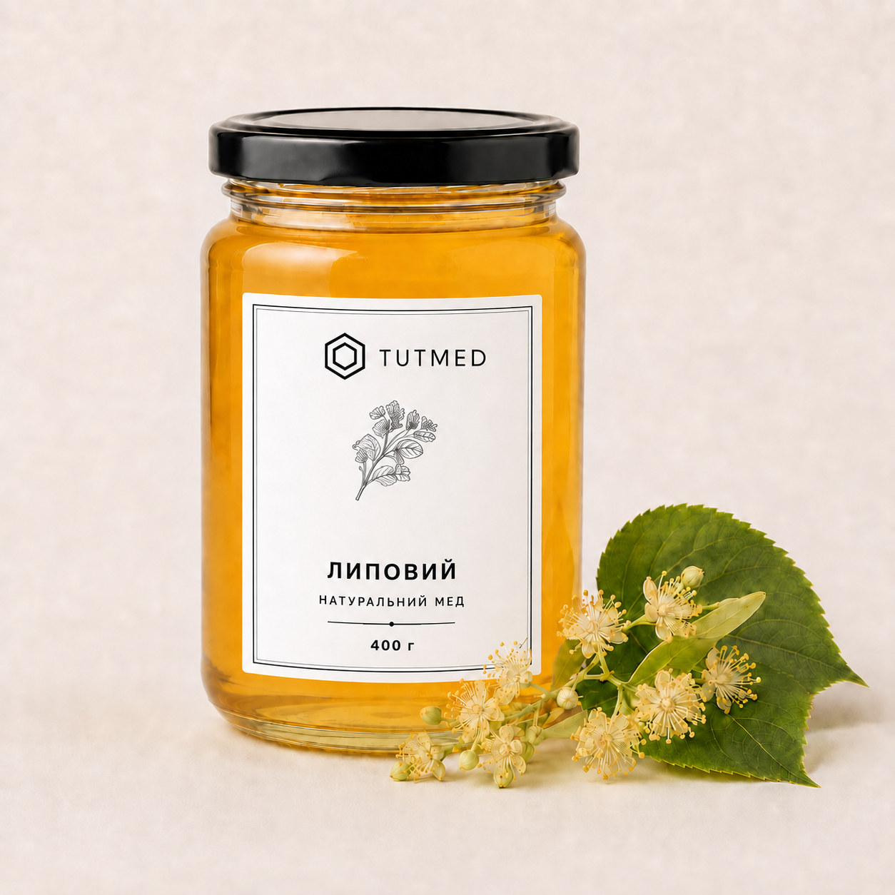 Липовий мед у скляній банці